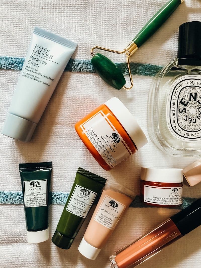 Minimal skincare bottles arranged in morning light